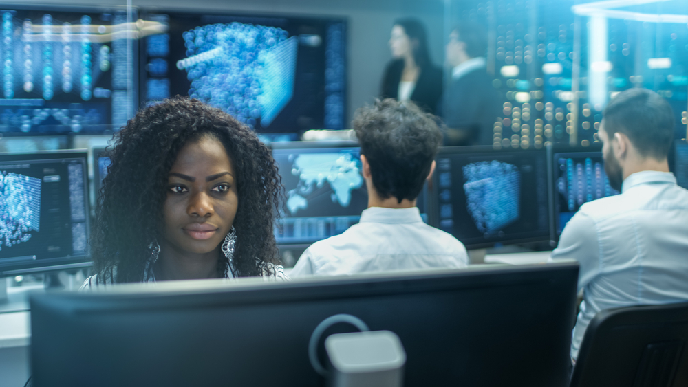 African American woman working in IT field or lab.